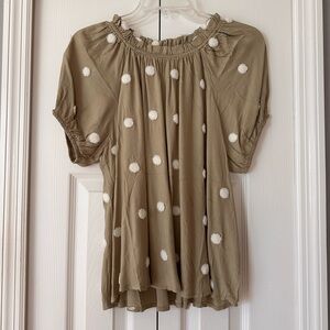 Light/safe green with white polka dots, short sleeve top